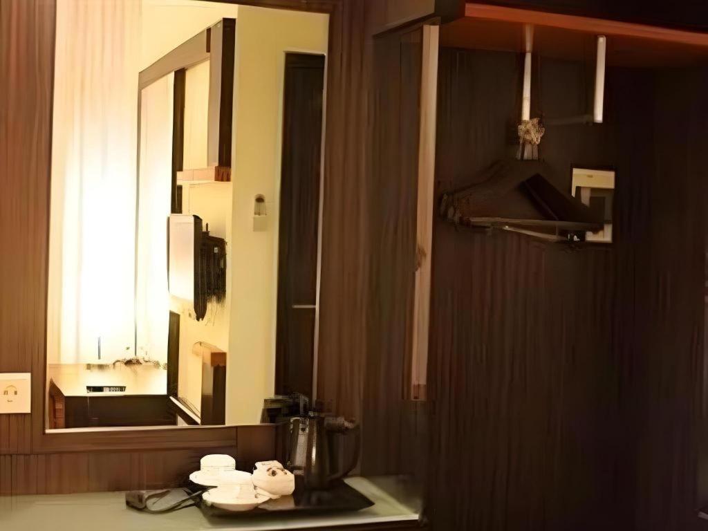 Travello Hotel Manado Bagian luar foto