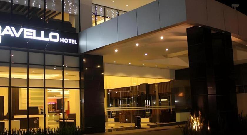 Travello Hotel Manado Bagian luar foto